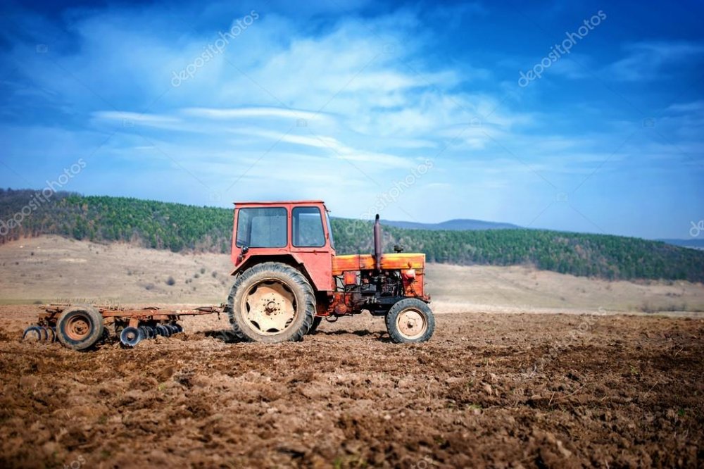 depositphotos_43199977-stock-photo-agriculture-and-harvesting-vintage-tractor.jpg